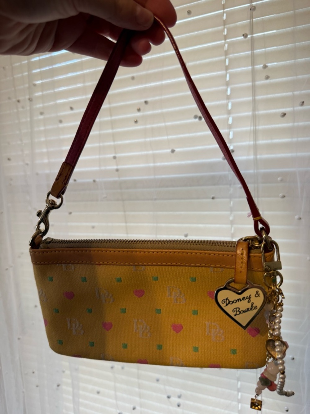 Dooney & Bourke Yellow Heart Print Wristlet with Pink Accents